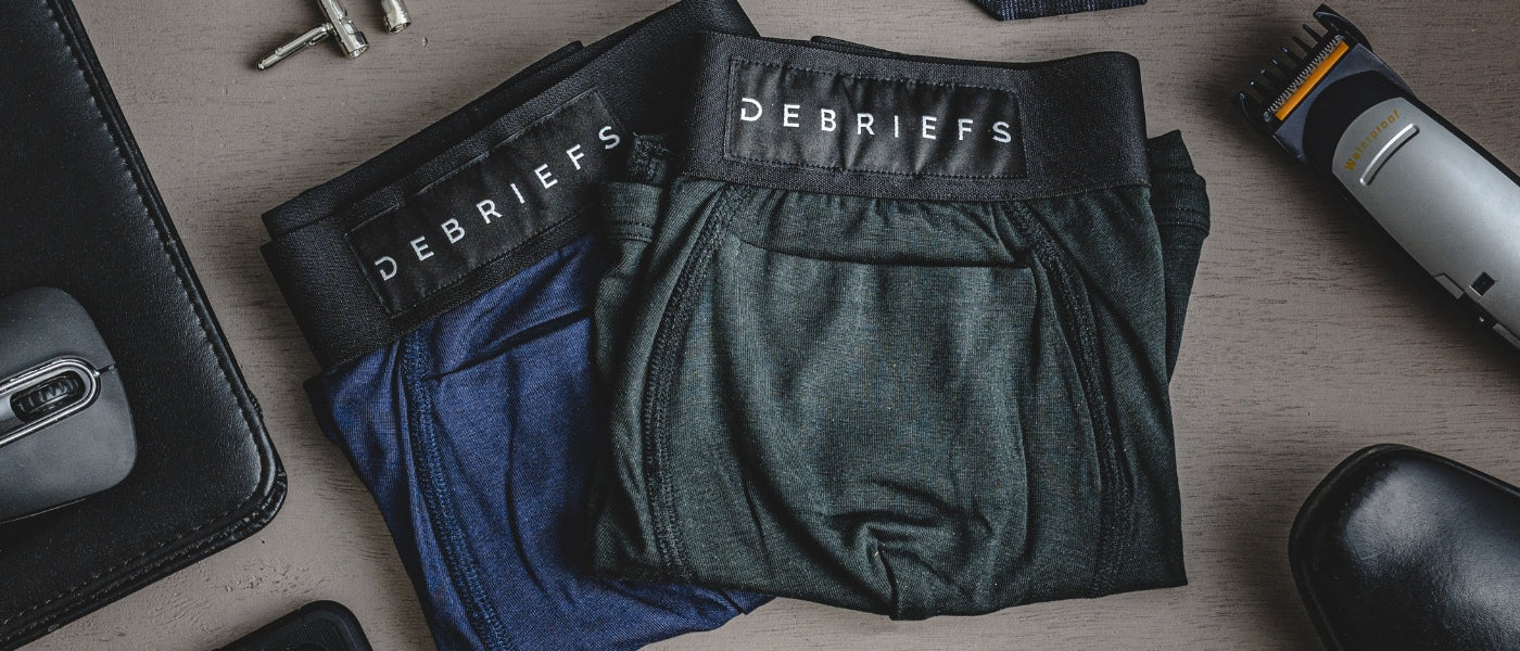 Collection of Debriefs mens underwear laying on table